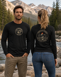Coastal Faith | Not All Who Wander Are Lost — Garment-Dyed Long Sleeve Tee | Compass + Mountain Badge | Veteran-Owned Small Business | Liberty & Victory Co.