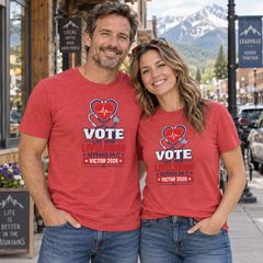 Colorado lifestyle — healthcare graphic, Heather Red T-shirts worn by a man and woman in a Colorado town