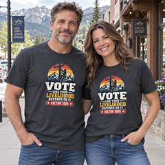 Colorado lifestyle — lineman graphic, Dark Grey Heather T-shirts worn by a man and woman in a Colorado town