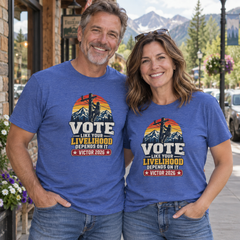 Colorado lifestyle — lineman graphic, Heather True Royal T-shirts worn by a man and woman in a Colorado town