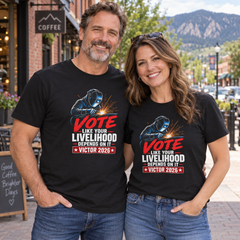 Colorado lifestyle — welder graphic, Black T-shirts worn by a man and woman in a Colorado town