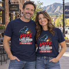 Colorado lifestyle — welder graphic, Navy T-shirts worn by a man and woman in a Colorado town